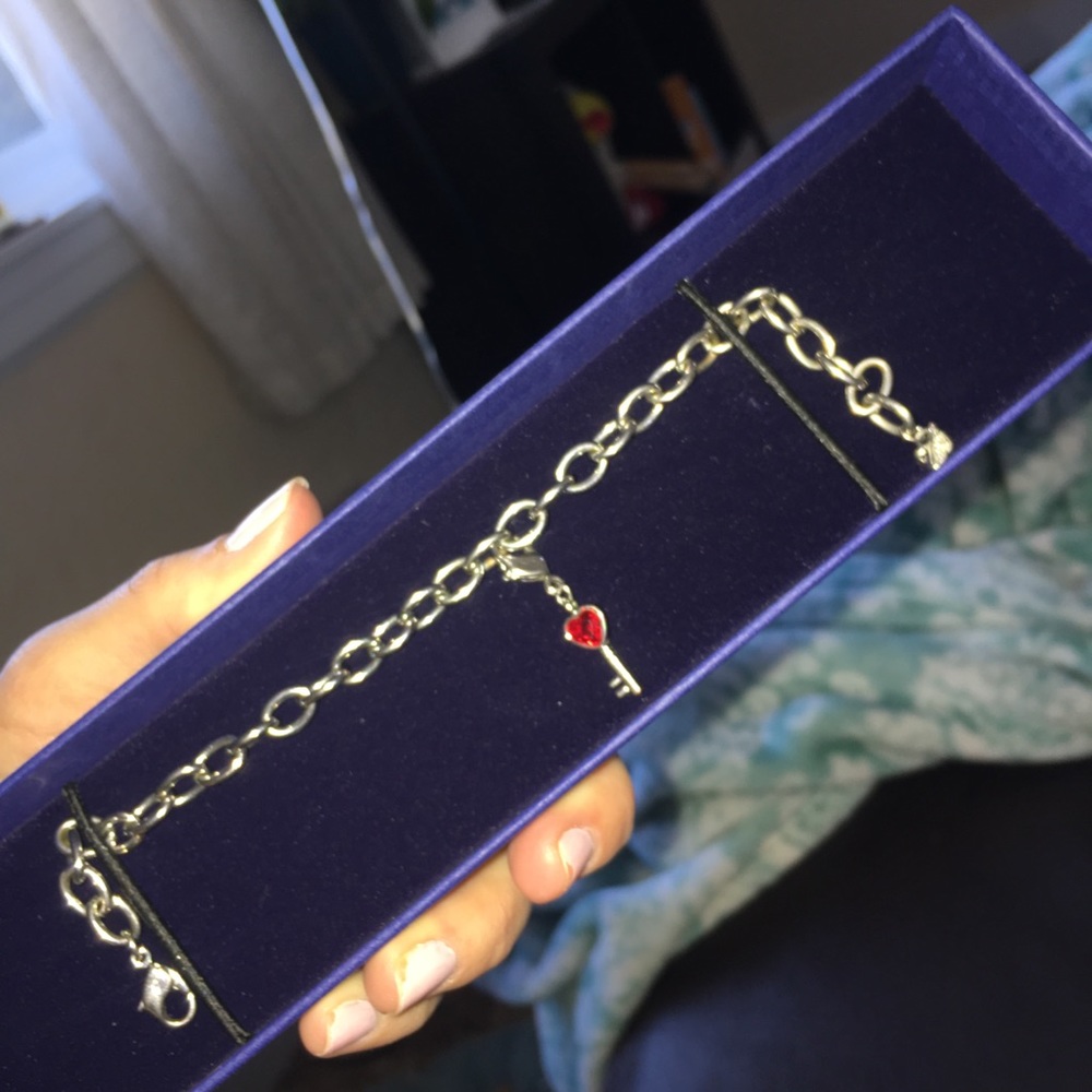 Swarovski charm bracelet with heart charm included